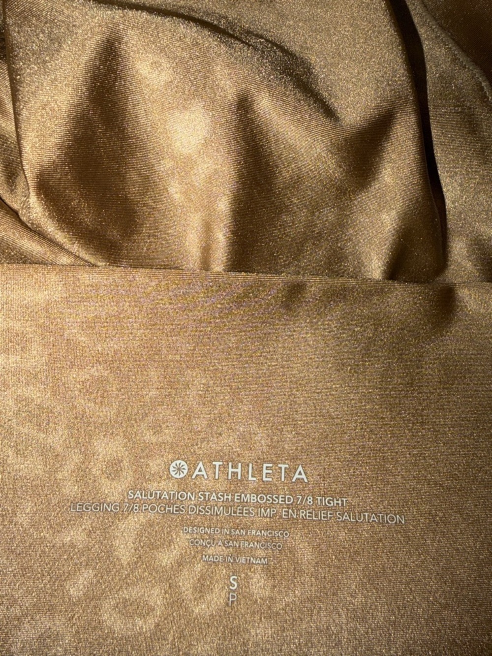 Athleta Salutation Stash 7/8 High Rise Gold Shine Embossed Leopard leggings - Picture 6 of 6